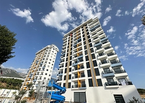 Квартира 1+1 в новом жилом комплексе в районе Махмутлар