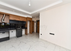 Квартира 1+1 в новом жилом комплексе в районе Махмутлар