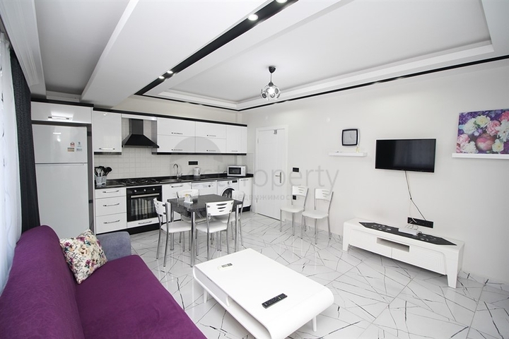 Меблированная квартира планировкой 2+1 в самом центре Алании