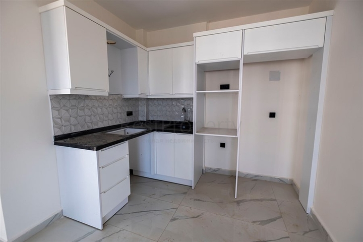 Квартира 1+1 в районе Махмутлар