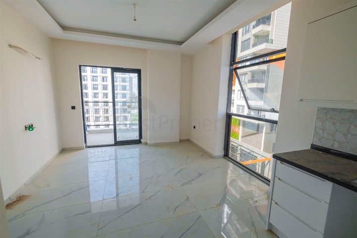 Квартира 1+1 в районе Махмутлар