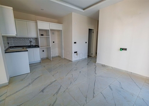 Квартира 1+1 в районе Махмутлар