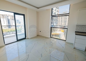 Квартира 1+1 в районе Махмутлар