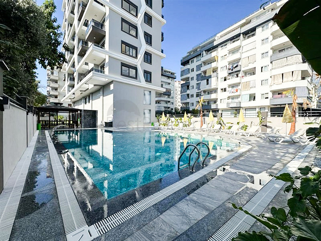 Квартира 1+1 в новом жилом комплексе в районе Махмутлар