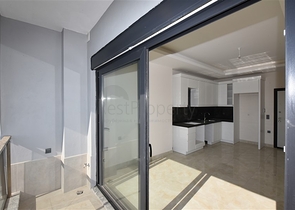 Квартира 1+1 в новом жилом комплексе в районе Махмутлар