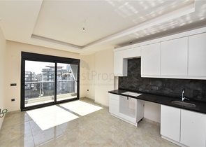 Квартира 1+1 в новом жилом комплексе в районе Махмутлар