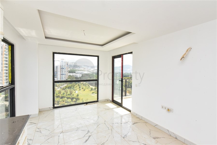 Квартира 1+1 с видом на горы и море в районе Махмутлар