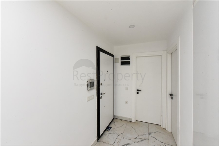 Квартира 1+1 с видом на горы и море в районе Махмутлар