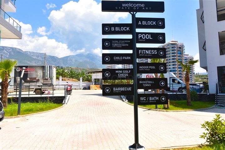 Квартира 1+1 с видом на горы и море в районе Махмутлар