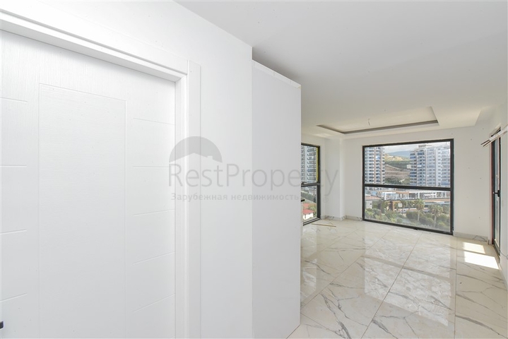 Квартира 1+1 с видом на горы и море в районе Махмутлар