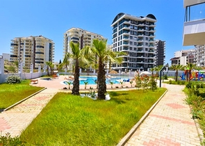 Квартира 1+1 с видом на горы и море в районе Махмутлар