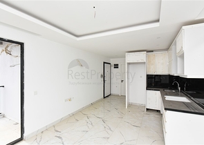 Квартира 1+1 с видом на горы и море в районе Махмутлар