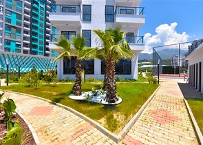 Квартира 1+1 с видом на горы и море в районе Махмутлар