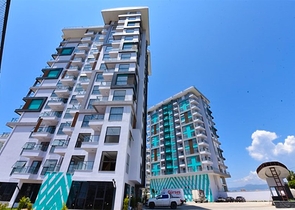 Квартира 1+1 с видом на горы и море в районе Махмутлар