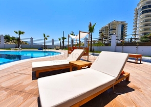 Квартира 1+1 с видом на горы и море в районе Махмутлар