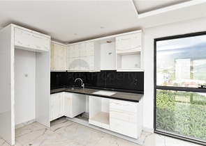 Квартира 1+1 с видом на горы и море в районе Махмутлар