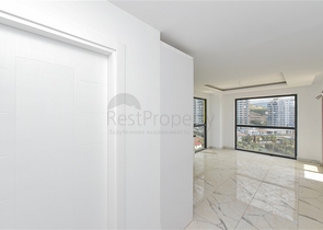 Квартира 1+1 с видом на горы и море в районе Махмутлар