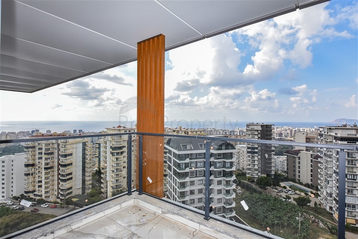 Квартира 1+1 в новом доме в районе Махмутлар