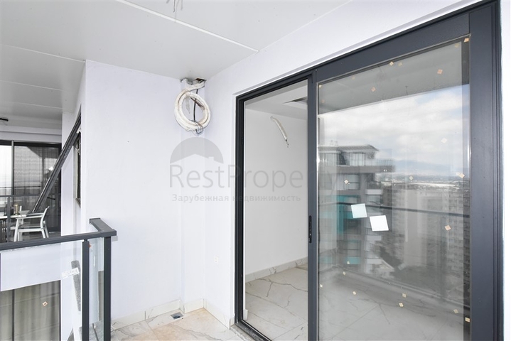 Квартира 1+1 в новом доме в районе Махмутлар