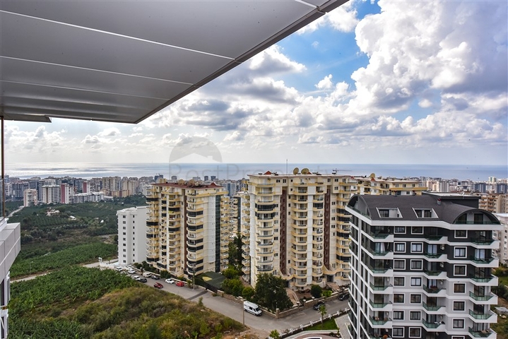 Квартира 1+1 в новом доме в районе Махмутлар