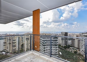 Квартира 1+1 в новом доме в районе Махмутлар