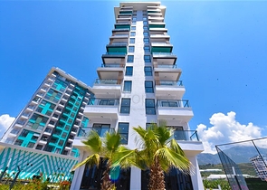 Квартира 1+1 в новом доме в районе Махмутлар