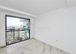 Квартира 1+1 в новом доме в районе Махмутлар