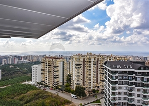 Квартира 1+1 в новом доме в районе Махмутлар