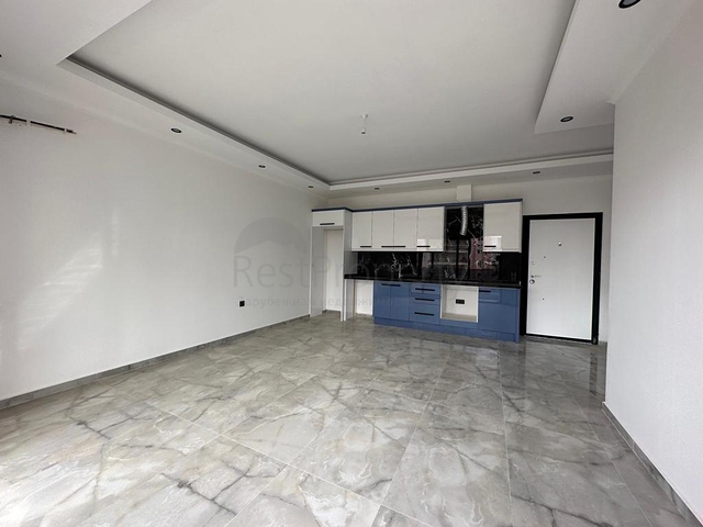 Квартира планировкой 1+1 в районе Махмутлар