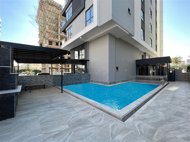 Квартира планировкой 1+1 в районе Махмутлар