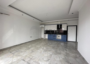 Квартира планировкой 1+1 в районе Махмутлар