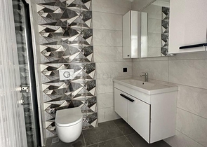 Квартира планировкой 1+1 в районе Махмутлар