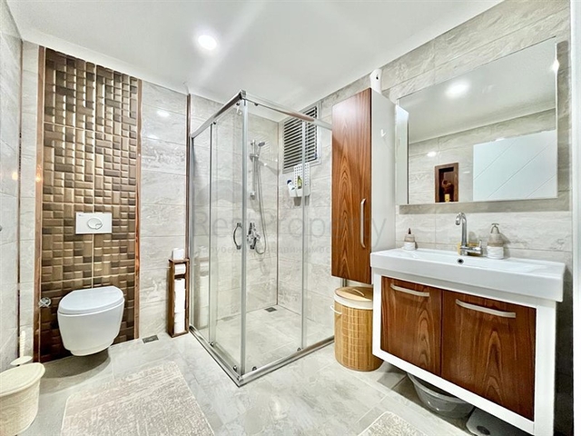 Просторная квартира 1+1 в районе Махмутлар 