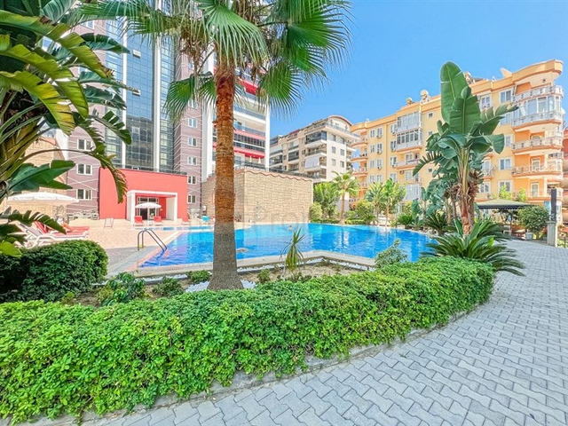 Просторная квартира 1+1 в районе Махмутлар 