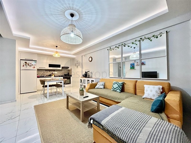 Просторная квартира 1+1 в районе Махмутлар 