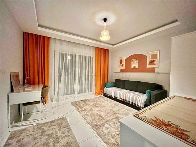 Просторная квартира 1+1 в районе Махмутлар 