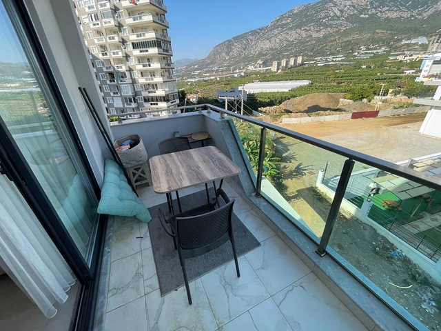 Двухкомнатная квартира в районе Махмутлар