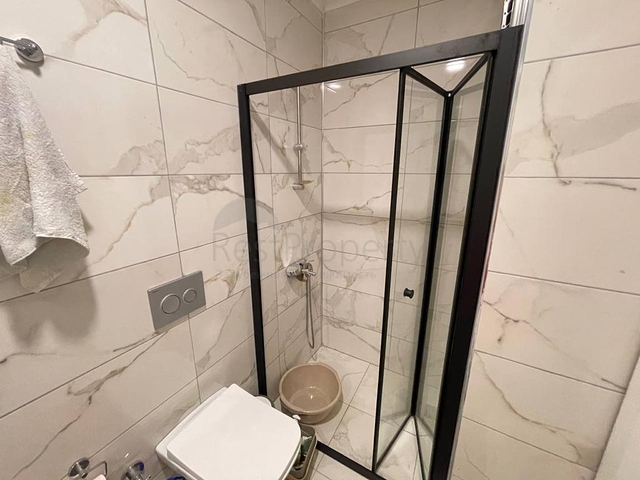 Двухкомнатная квартира в районе Махмутлар