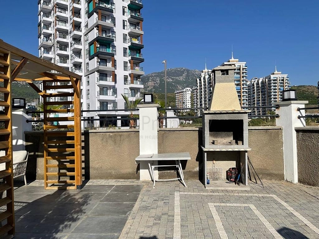 Двухкомнатная квартира в районе Махмутлар