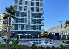 Двухкомнатная квартира в районе Махмутлар