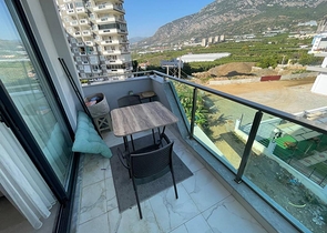 Двухкомнатная квартира в районе Махмутлар