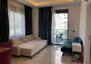 Двухкомнатная квартира в районе Махмутлар