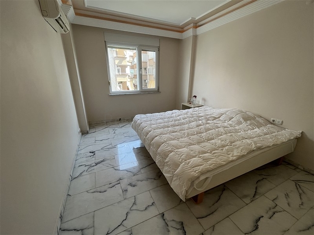 Квартира планировкой 3+1 в районе Тосмур 50м до моря.