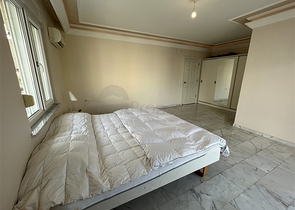 Квартира планировкой 3+1 в районе Тосмур 50м до моря.