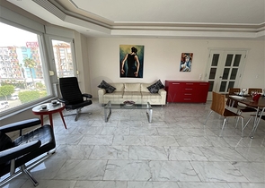 Квартира планировкой 3+1 в районе Тосмур 50м до моря.