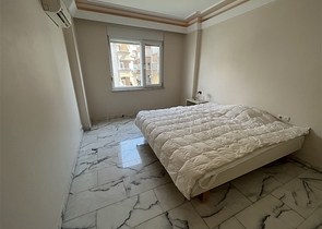 Квартира планировкой 3+1 в районе Тосмур 50м до моря.