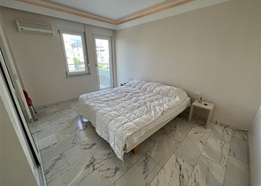 Квартира планировкой 3+1 в районе Тосмур 50м до моря.