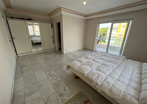 Квартира планировкой 3+1 в районе Тосмур 50м до моря.