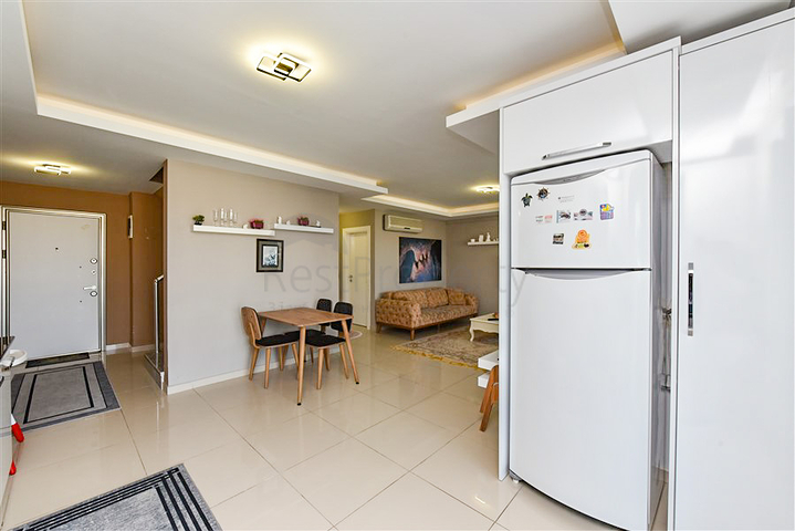 Меблированный пентхаус 2+1 всего в 200 метрах от моря