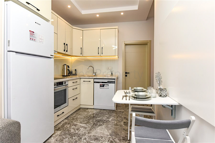 Двухкомнатная квартира с выходом в сад в центре Аланьи